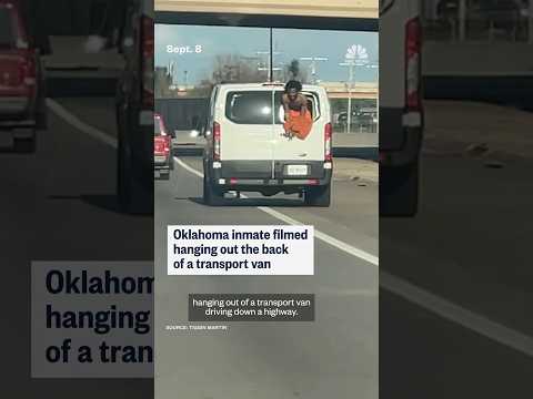 Oklahoma inmate filmed hanging out the back of a transport van